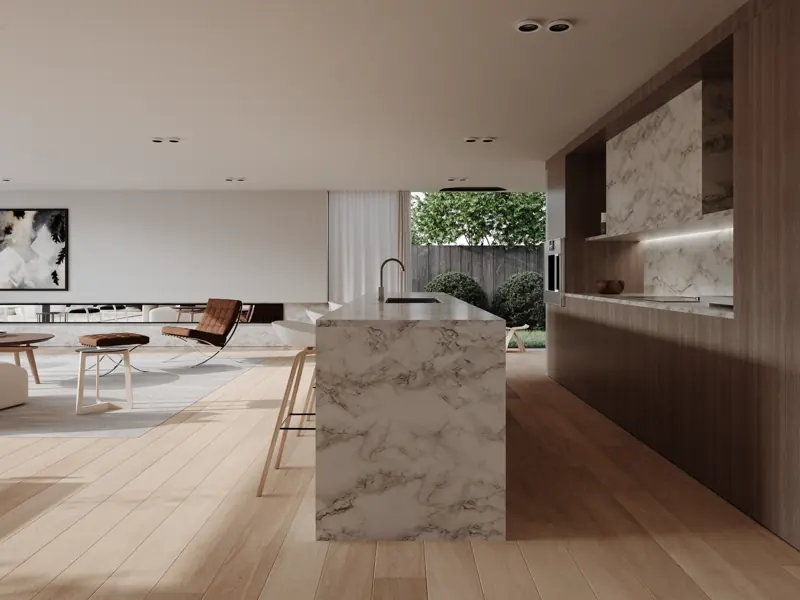 Stylish modern kitchen and living room with marble countertops and open design.