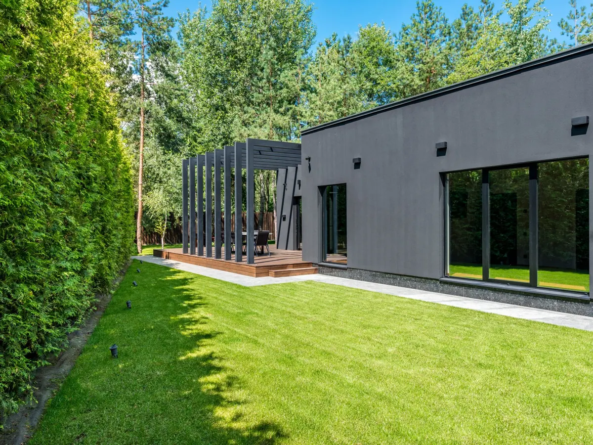 A tidy family home with a green lawn